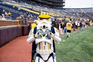 Michigan returns home as double-digit favorite vs. reeling Wisconsin