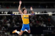 Higher and higher! The man called Mondo breaks pole vault world record for the 14th time