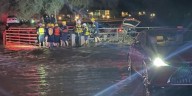 2 rescued from cars trapped in flooded Phoenix wash