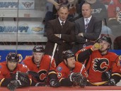What brings Dave Lowry back to Flames, and what can he bring to the bench staff?