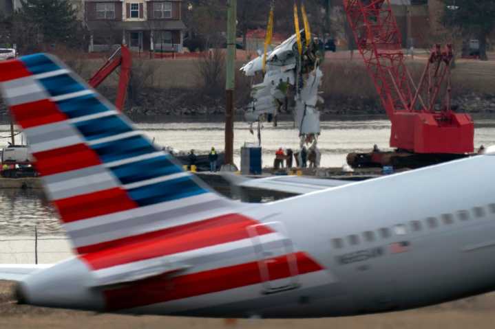 Family of 1 of the 67 Washington plane crash victims sues the FAA, Army and American Airlines