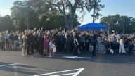Community honors fallen Edgewater officer at candlelight vigil