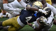 No. 22 Notre Dame content to grind it out with backfield tandem of Jadarian Price and Jeremiyah Love