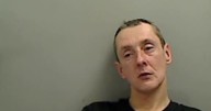 Robber broke victim's nose after 'pinning' him to wall and rifling through pockets