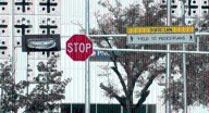 Conversion of Albuquerque intersections to four
