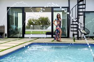 Woman earns $22K a month renting out her backyard pool