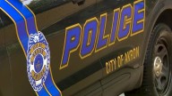 Woman shot at two drivers on Akron road: police