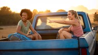 Is it illegal to ride in the bed of a truck in Iowa?