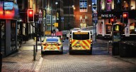 Police called as man walks down busy city road completely naked