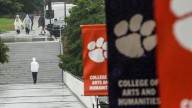 Clemson fires employee, halts others' teaching duties over Kirk posts