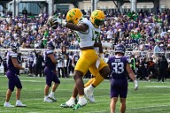 No. 4 Oregon cruises past Northwestern 34