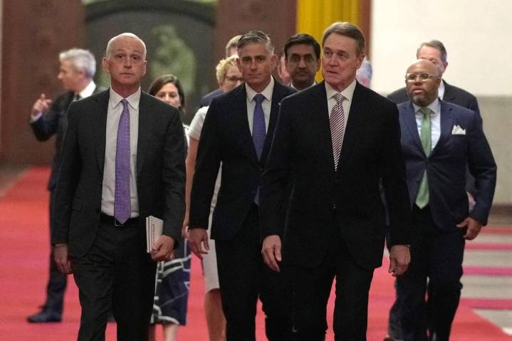 US lawmakers push for military dialogue in a rare China visit