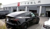 Tesla is redesigning its door handles following safety probe, Bloomberg investigation