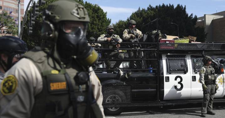 California lawmakers pass bill barring authorities from wearing face masks