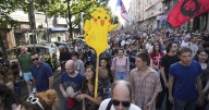 Thousands rally in Serbia and accuse police of brutality at anti