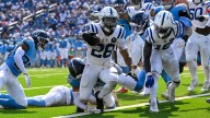 Jonathan Taylor's 3 TDs keeps Colts undefeated with 41-20 thumping of winless Titans