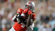 Sayin passes for 3 touchdowns, top-ranked Ohio State pulls away in second half to defeat Ohio 37