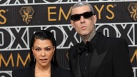 Kourtney Kardashian's son Rocky looks just like his mom with long dark hair in new photos with dad Travis Barker