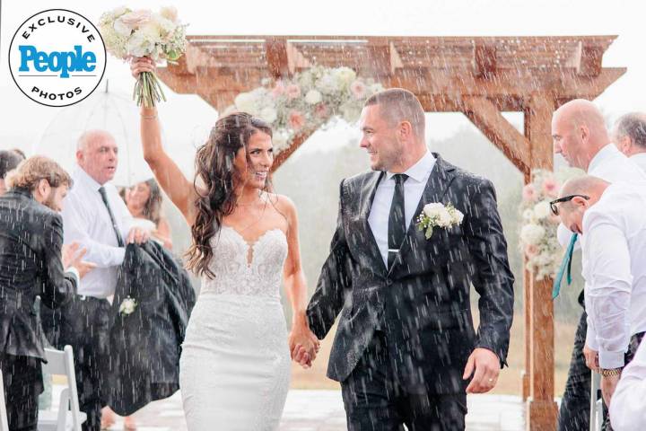 Downpour at Wedding Becomes 'Notebook' Moment for Newlyweds (Exclusive)