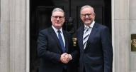 PM all smiles on subs pact after Downing Street chat