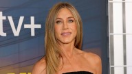 Jennifer Aniston is glowing as new boyfriend Jim Curtis supports her on The Morning Show red carpet