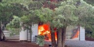 Firefighter hospitalized after fighting garage fire