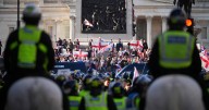 Nine arrests and 'many more' likely as police attacked at Tommy Robinson protest