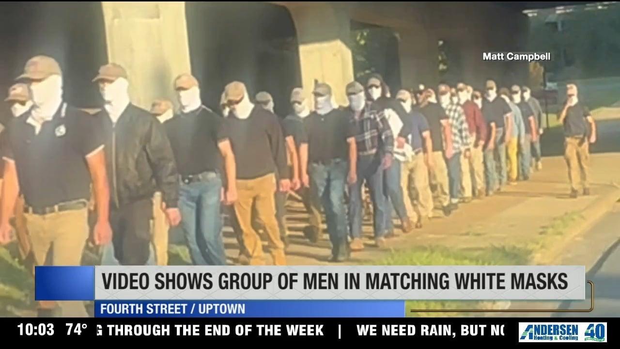 Video of masked men walking near Uptown draws attention