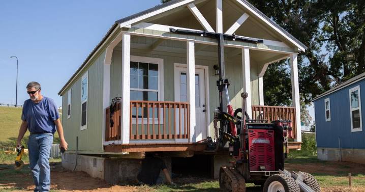 Tiny homes community for homeless adds units, residents