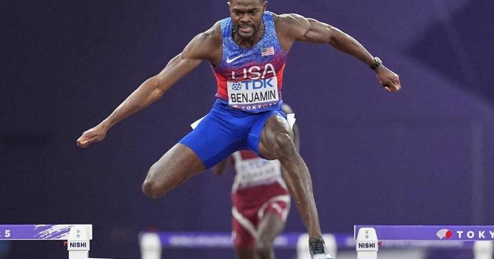 Benjamin wins 400 hurdles, is disqualified, then given worlds gold medal