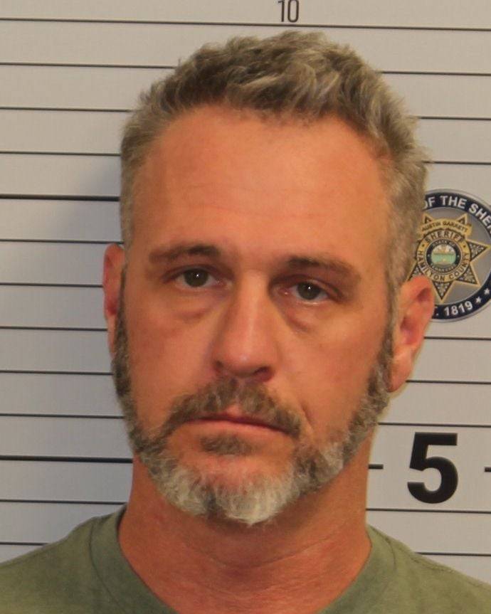 Man arrested at driver services center for threatening mass violence