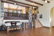 See inside $1.3M home with Italian influence, railing from 1900s Dodge mansion