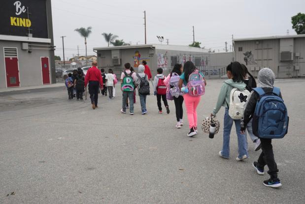 Teachers sue over Trump’s immigration crackdown, saying students are staying home