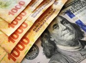 El dólar oficial toca el techo de la banda y esperan medidas del gobierno