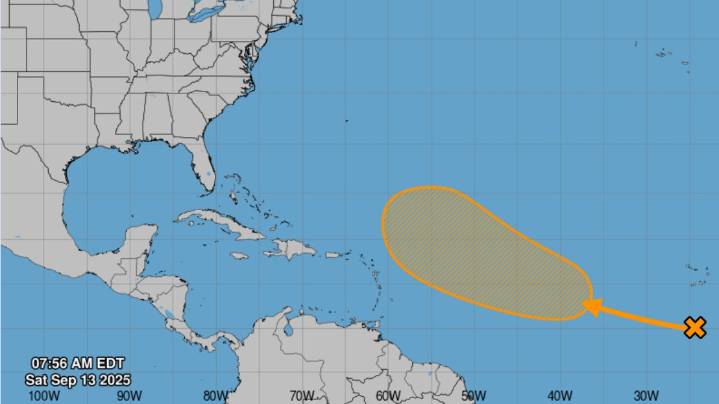 Hurricane center in Florida tracking disturbance and 3 tropical waves