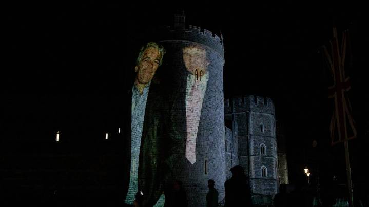 Photos: Activists beam Trump, Epstein images onto U.K. castle during president's visit