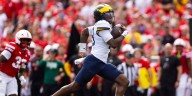 Michigan leads Nebraska 27-20 in the fourth quarter