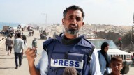 Al Jazeera reporter on road out of Gaza City as thousands flee