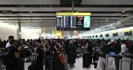 Passengers left stranded at airports for second day as airlines count cost of cyber attack