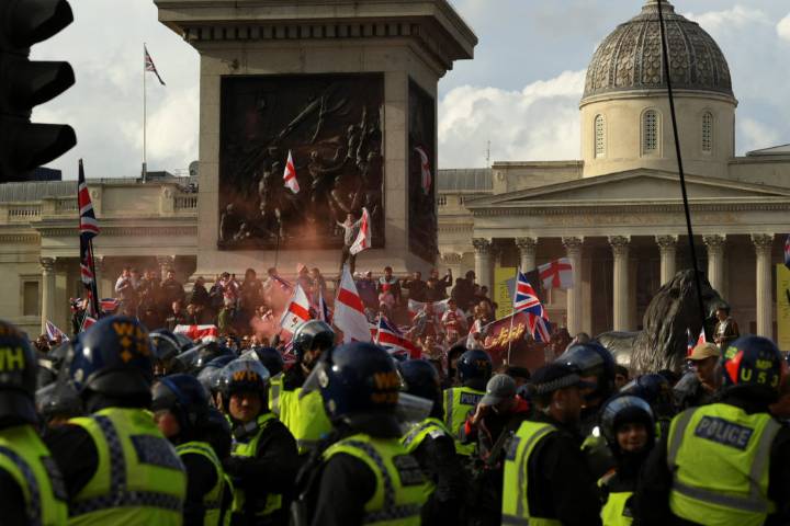 London protest organized by far-right activist exceeds 100,000 as clashes break out