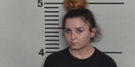 Woman allegedly tried to kill sister by setting fire to mattress
