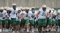 Iowa high school football coaches discuss college recruiting changes