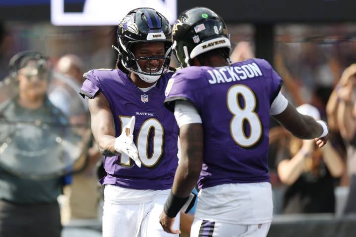 Jackson throws 4 TD passes, and the Ravens close strong in a 41