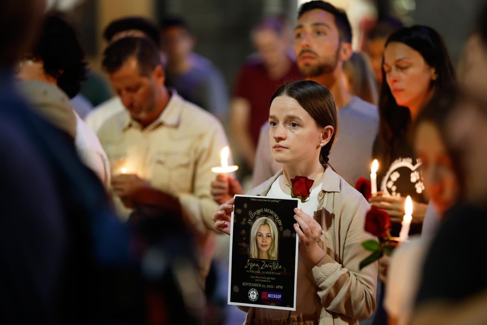 Hundreds of people attend a candlelight vigil honoring Iryna Zarutska in Charlotte