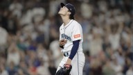 Woo strikes out 13 as Mariners beat Angels 5