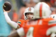 Carson Beck, Mark Fletcher Jr. lead the way as No. 5 Miami rolls past No. 18 USF, 49