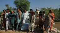 Floodwaters begin receding in a major Pakistani city but nearby towns face evacuations