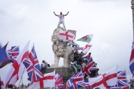 Far-right anti-immigration protests in London lead to clashes with police