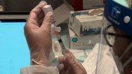 COVID-19 surging in San Antonio as new vaccine restrictions kick in, causing confusion
