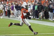 No. 10 Miami digs in late, tops No. 6 Notre Dame 27
